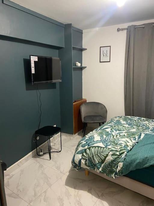 Appartement Charmant Studio Dans Maison à Sarcelles Extérieur photo